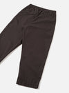 Rear view photograph of the Brown Micro Canvas Oxford Pant set against a plain white studio backdrop. The image shows the back pocket construction, clean hem finish, and loose silhouette of the brown micro-canvas cotton trousers.