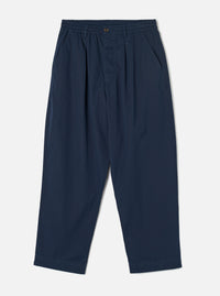 Front view photograph of the Navy Micro Canvas Oxford Pant on a plain white studio backdrop. The image demonstrates the loose wide-leg cut, drawstring waist, front pleating, and dark navy blue micro-canvas cotton material.