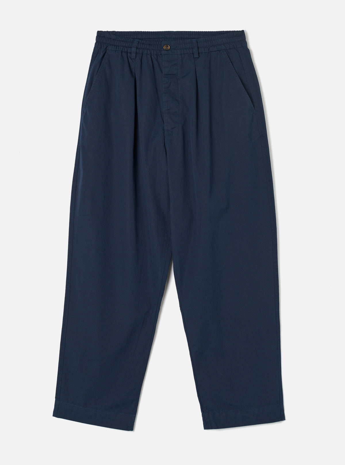 Front view photograph of the Navy Micro Canvas Oxford Pant on a plain white studio backdrop. The image demonstrates the loose wide-leg cut, drawstring waist, front pleating, and dark navy blue micro-canvas cotton material.