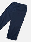 Rear view shot of the Navy Micro Canvas Oxford Pant presented against a clean white studio background. The shot highlights the back pocket layout, loose trouser silhouette, and solid dark navy cotton micro-canvas fabric.