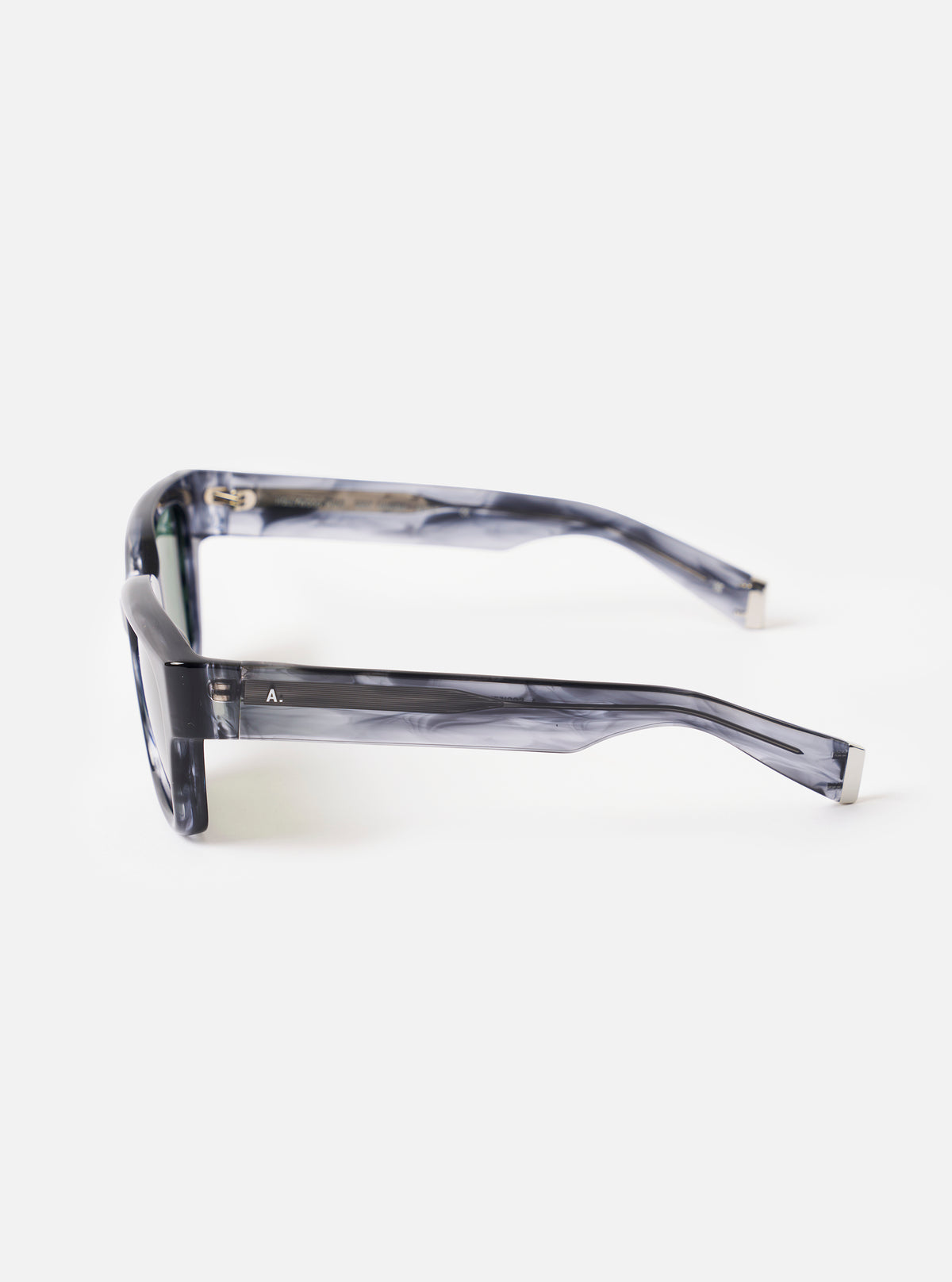 Detailed close-up shot of the fold and temple of the A. SOCIETY x Universal Works Grey Havana Hollywood Sunglasses against a neutral background, focusing on the hinges and grey Havana pattern.