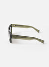 Detailed close-up shot of the A. SOCIETY x Universal Works Olive Hollywood Sunglasses resting on a white background, highlighting the fine metallic hardware details, temple tips, and smooth olive finish.