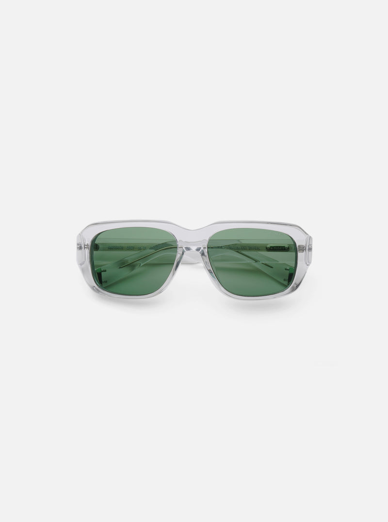 Close-up of A. SOCIETY x Universal Works Grey Aberdeen Sunglasses on a white background. The frames are clear grey and the lenses are green.