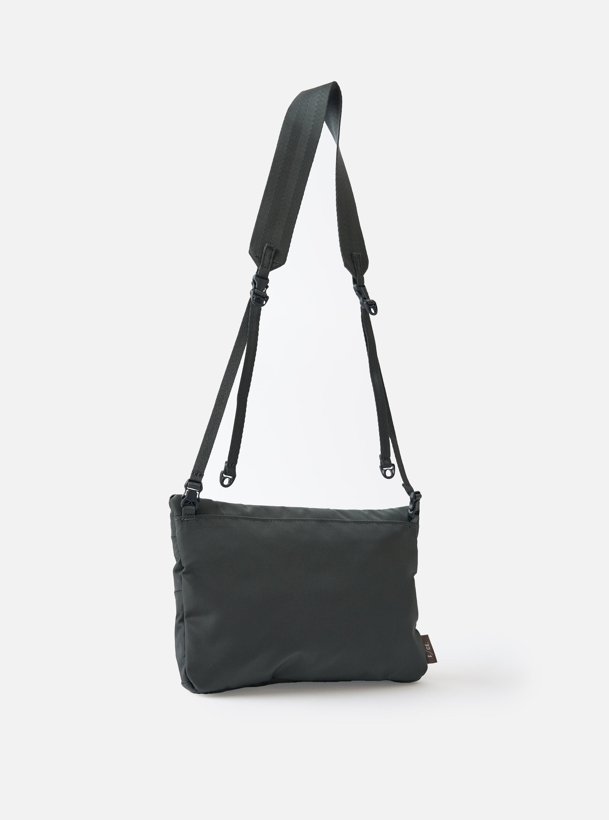 The F/CE.® Grey 420 re/cor Sacoche bag. Grey nylon with adjustable strap. Studio shot on white backdrop. 