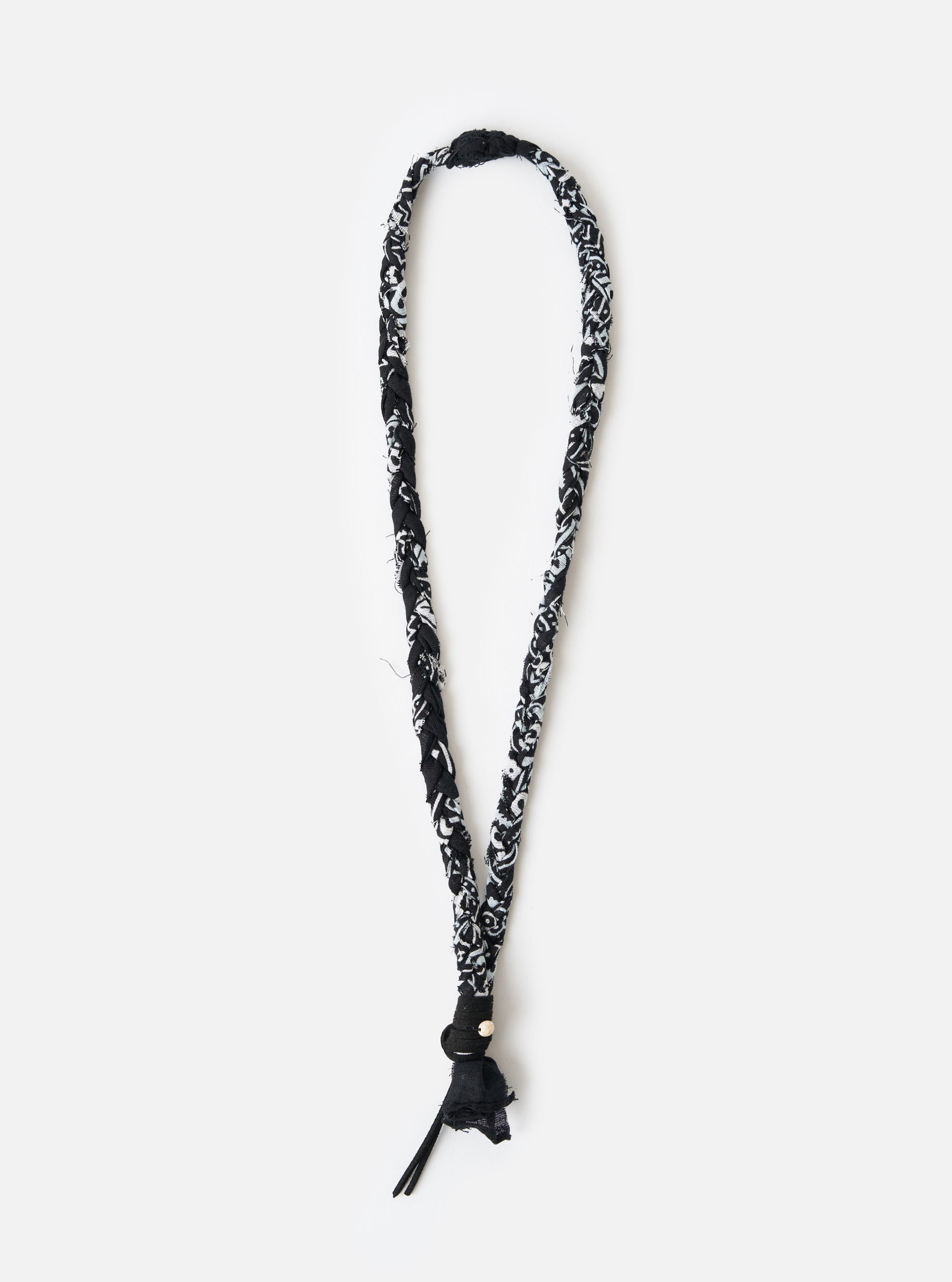 Hanami of Rome Black/Black Leather/White Turquoise Bead Bandana Necklace No.48 on a white background. The necklace is made of black and white patterned fabric and has a leather tassel.