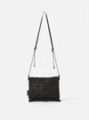 master-piece x Universal Works Black Recycled Tech Canvas Sacoche. Black canvas bag with adjustable strap on a white background. 