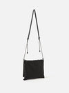master-piece x Universal Works Black Recycled Tech Canvas Sacoche on a clean white background. The black bag hangs by a thin strap. The material looks durable and modern.