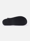The Organic Handloom Black Leather Gurkha is shown in a detail view as a flat lay against a plain white background. The image focuses on the bottom of the shoe, highlighting the black foam rubber outsole and its textured tread pattern designed for grip and durability.