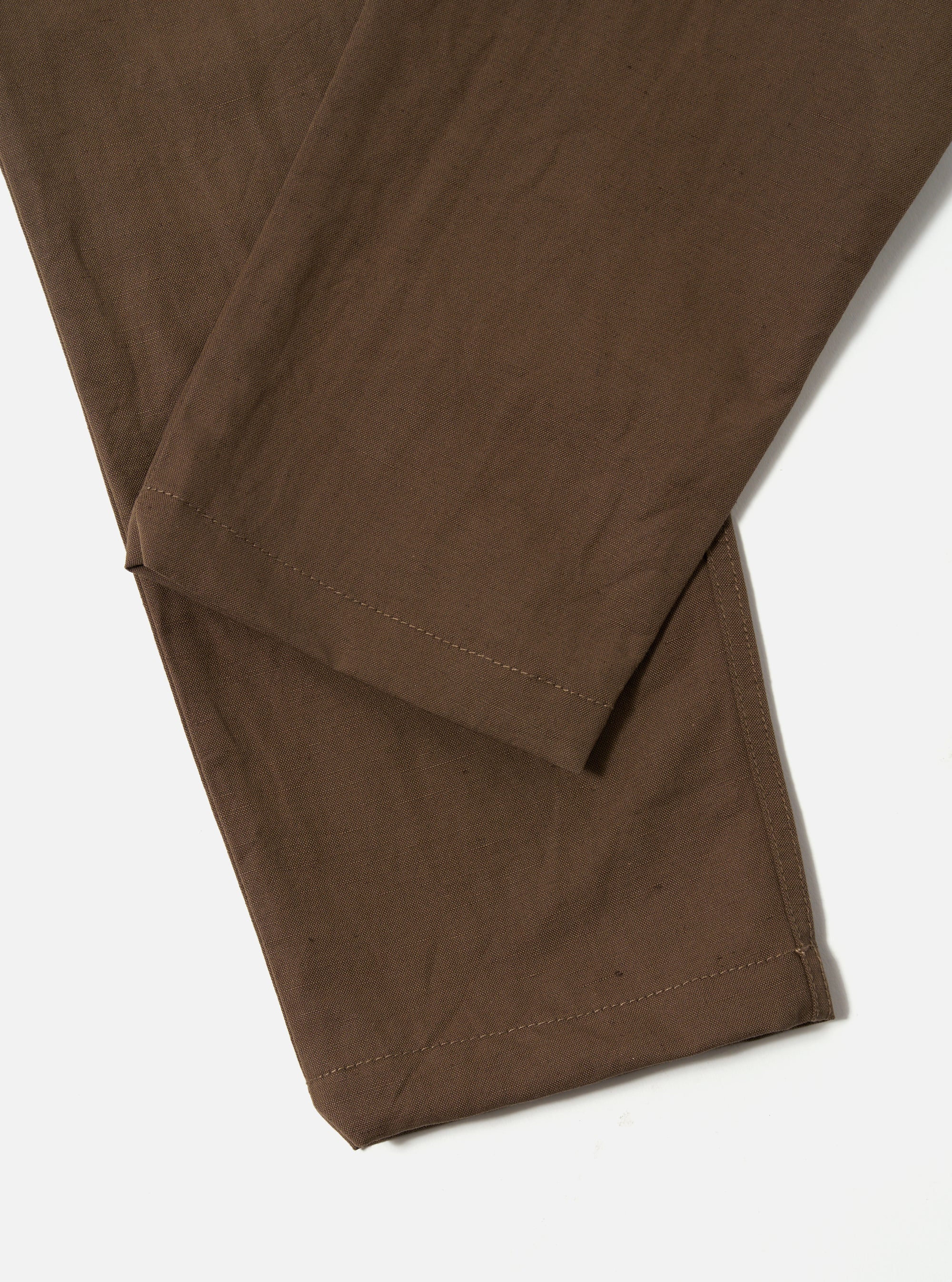 Close-up of the Khaki Linen Slub Weave Military Chino on a white background. The khaki color and linen texture are visible.