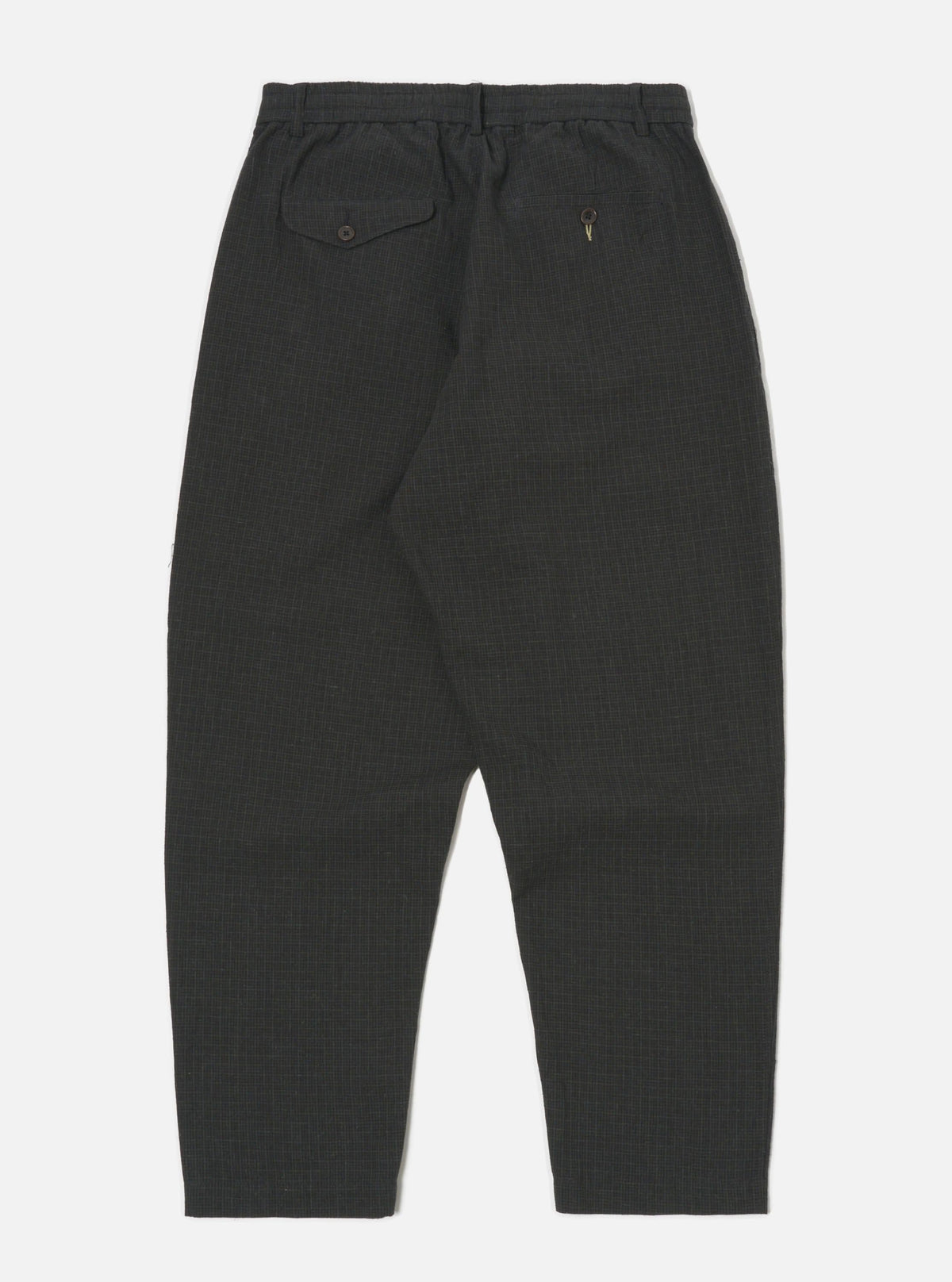 Studio shot of the back of Charcoal Fine Linen Mix Pleated Track Pant on a white background. The pants have a relaxed fit and visible pocket details.