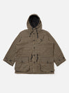 The Sand Cortina Tweed Boston Parka on a white background. The parka is tweed with a black and tan houndstooth pattern. It has a hood and button closure.
