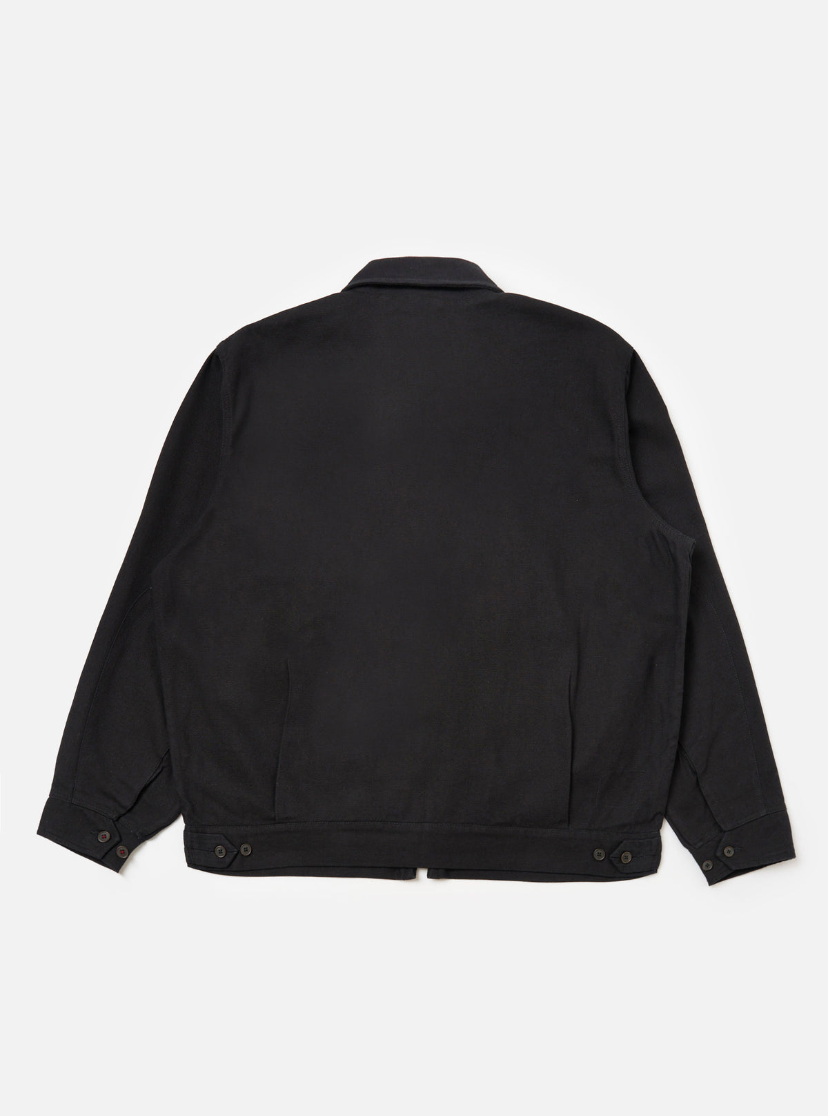 Back view of the Black Organic Canvas S130 Jacket on a white background. The jacket is made of black canvas material and has a classic fit.
