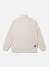 The Ecru Single Jersey Funnel Neck Tee, laid flat on a white background. The tee is a light cream color and has a funnel neck. A small blue logo is on the lower left.