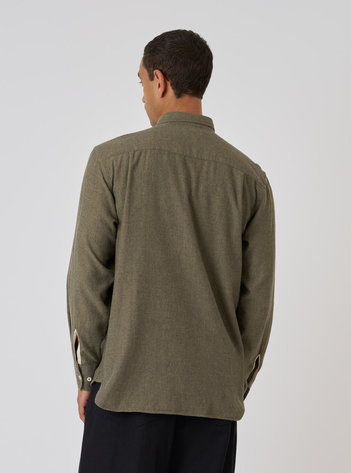 Back view of a model wearing a Mustard Brushed Marl Twill Square Pocket Shirt. The shirt is a brushed twill material with a marl texture, styled against a plain white backdrop.