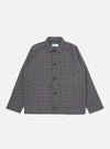 A Grey/Blue Jacquard Weave Field Jacket is shown laid flat against a solid white background. The garment features a textured jacquard-woven check pattern in shades of grey and blue, a classic pointed collar, a five-button front closure, and two large patch pockets at the waist.