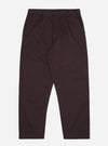 A pair of Brown Twill Dizzy Trousers is shown laid flat against a solid white background. The trousers feature a loose, wide-leg fit with a buttoned waistband and side slip pockets.