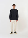 The Navy Broadcloth Lucky Shirt is displayed flat against a plain white background. The shirt features a relaxed fit with short sleeves, a classic camp collar, a full button-down front, and a single chest patch pocket.
