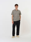 The Grey OS Stripe Jersey Vacation Polo is shown from a rear perspective, laid flat against a solid white background. The image highlights the horizontal grey and white stripes, the straight hem, and the back of the classic polo collar.