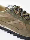 A top-down overhead shot of the Walsh x Universal Works Ensign in Green Leather/Canvas sneaker set against a plain white background, illustrating the lace arrangement, branded inner sockliner, and classic runner shape.