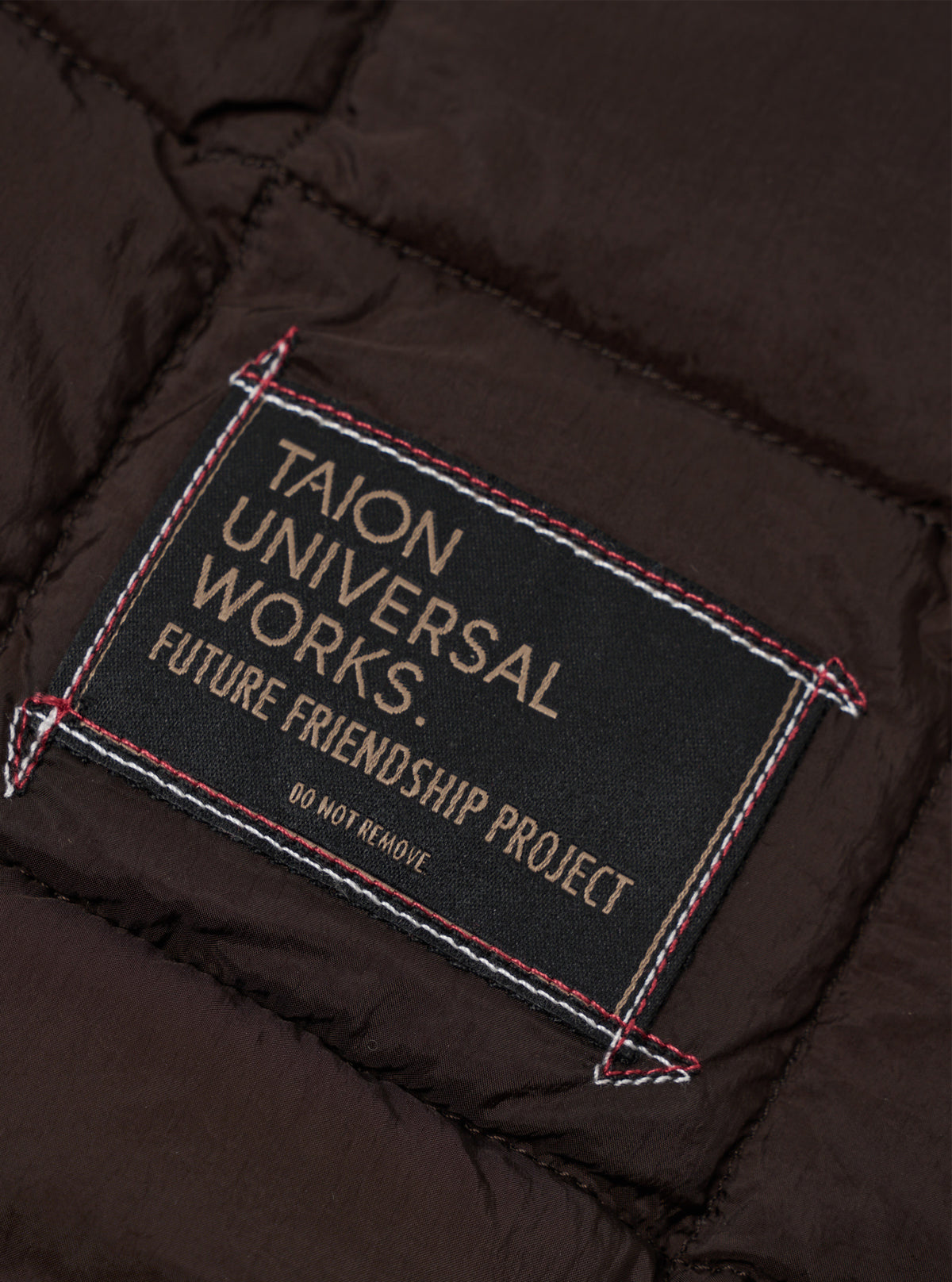 TAION x Universal Works Brown Nylon Soft Shell Down Rams Jacket