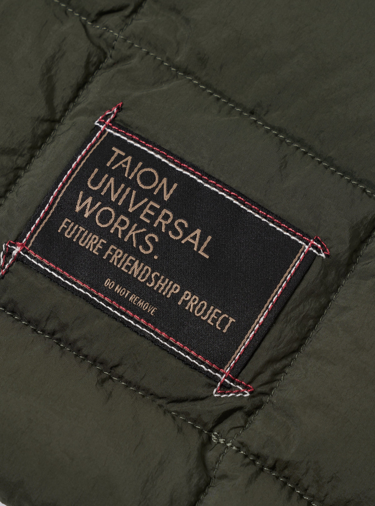 TAION x Universal Works Olive Nylon Soft Shell Down Rams Jacket