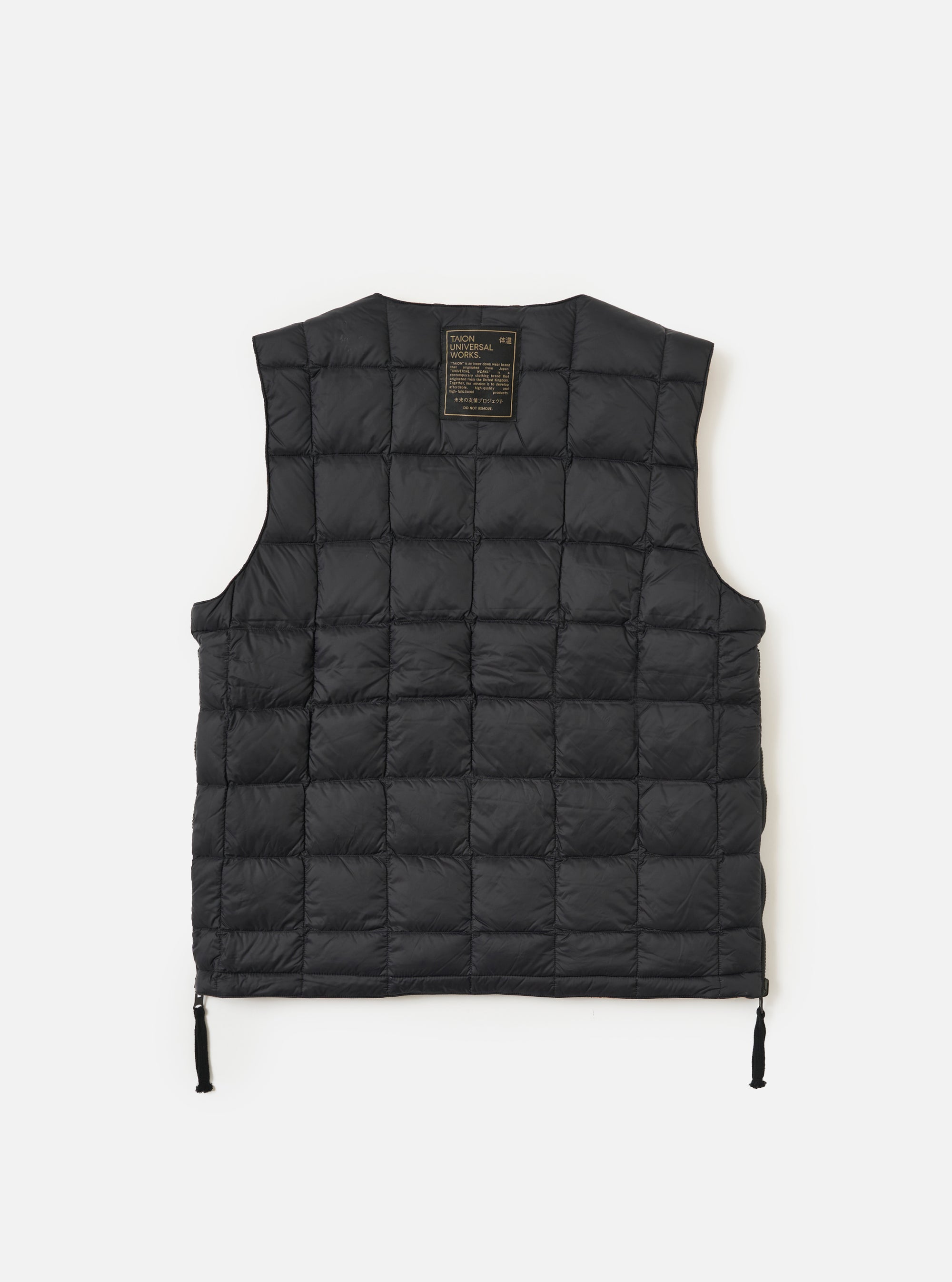 The TAION x Universal Works Reversible Black Military Line Vest is displayed on a white background. The vest is black, quilted, and sleeveless.