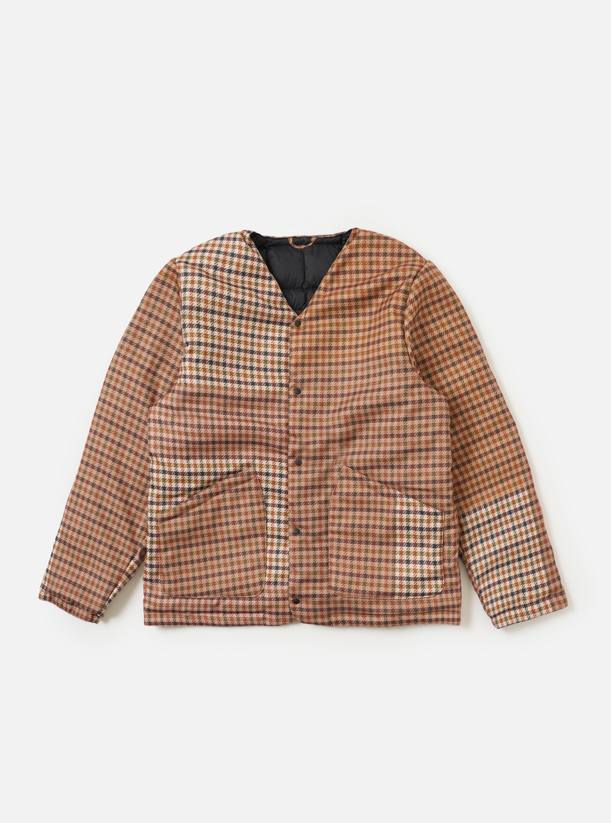 The TAION x Universal Works Reversible Black Military Line Liner Jacket, laid flat on a white background. The jacket is a brown plaid with black trim and a black quilted interior.