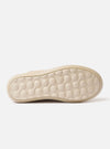 The Wander etc. 'The 70's' in Bone Hairy Suede/Leather is shown as a flat lay against a plain white background. The image provides a detailed view of the shoe, highlighting the textured bone-colored hairy suede upper, the low-cut silhouette, and the clean lines of the leather construction. The tonal phylon and rubber outsole is visible, emphasizing the vintage-inspired aesthetic.