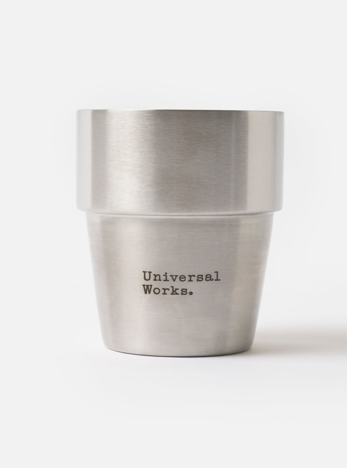 Studio shot of the Chilly's x Universal Works Set of 4 300ml Stackable Cups neatly stacked together on a plain white background, showcasing their double-walled stainless steel construction.