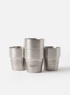 Overhead view of the Chilly's x Universal Works Set of 4 300ml Stackable Cups displayed on a plain white background, highlighting the open cup rims and internal double-walled structure.