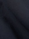 Close-up of the navy linen slub weave military chino fabric. The texture is visible, showing the weave of the material. The background is a plain surface.