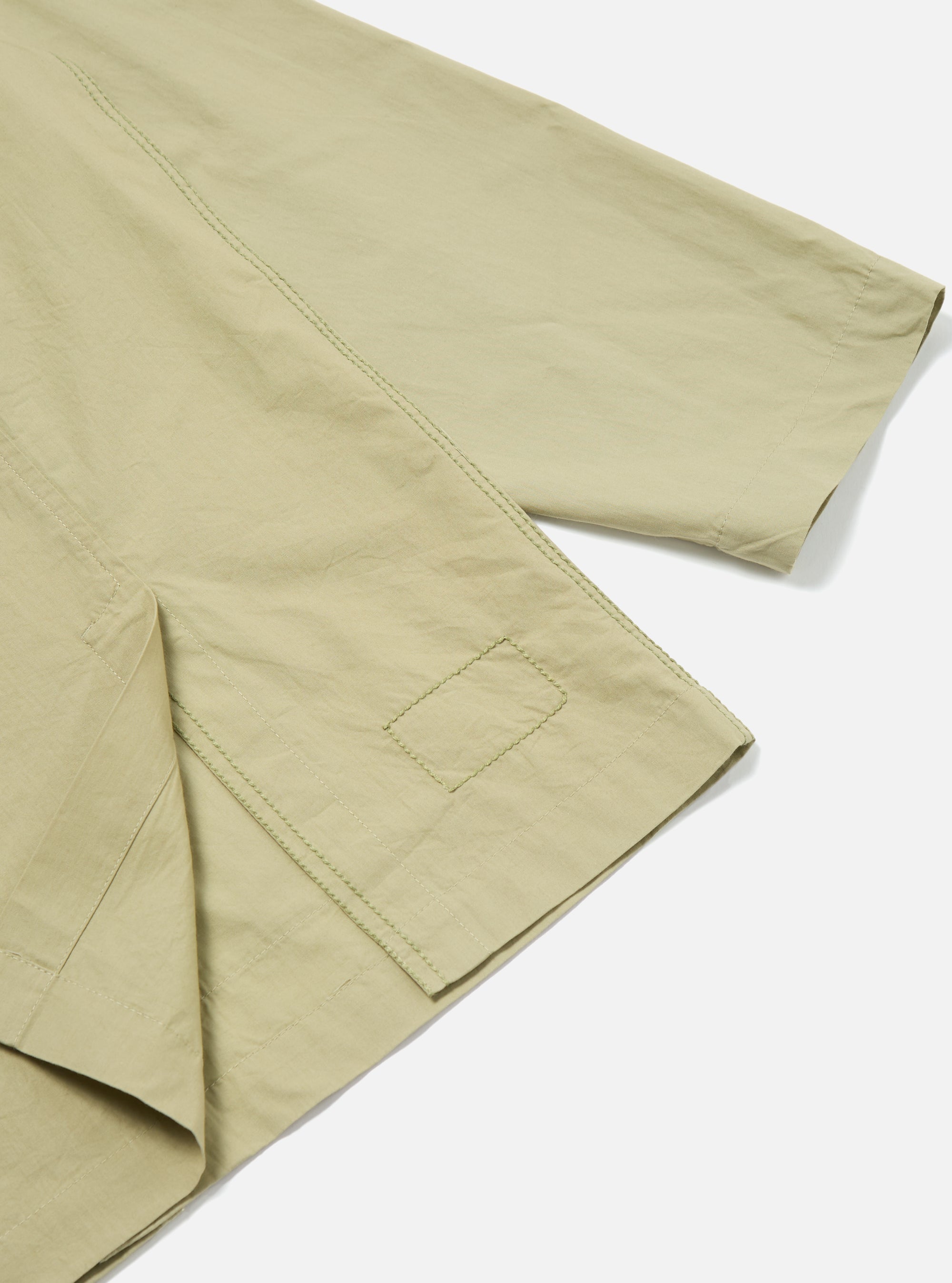 Close-up of the pale green Broadcloth Cancun Jacket on a white background, showing the fabric texture and stitching details.