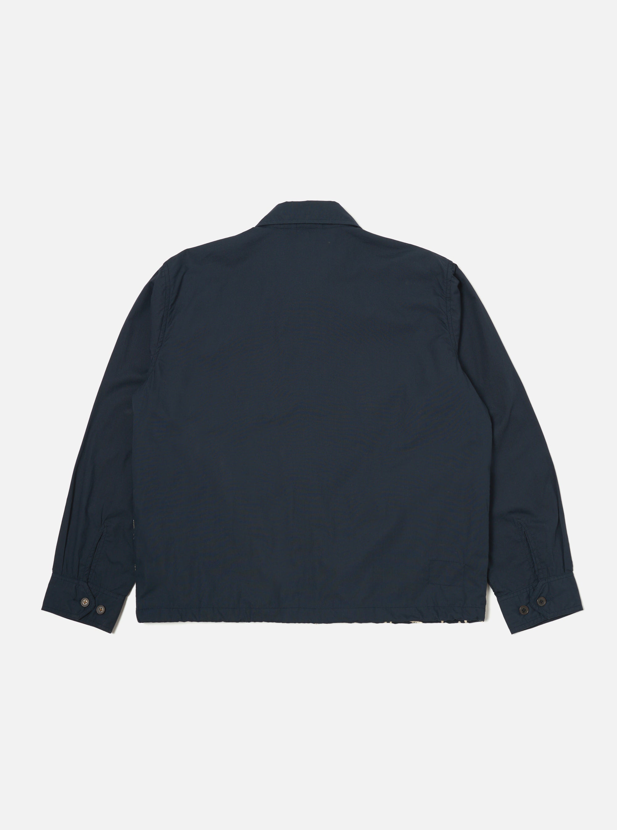 The Navy Mitla Broadcloth Club Jacket in navy is displayed on a white background. The jacket has long sleeves with buttoned cuffs and a classic collar.