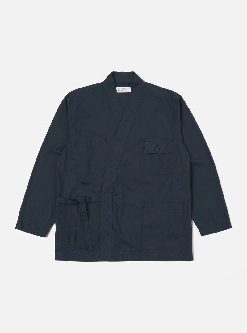 The Navy Broadcloth Osaka Work Jacket in navy broadcloth on a white background. The jacket has a tie waist, pockets and a relaxed fit.