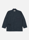 The Navy Broadcloth Osaka Work Jacket in navy broadcloth on a white background. The jacket has a tie waist, pockets and a relaxed fit.