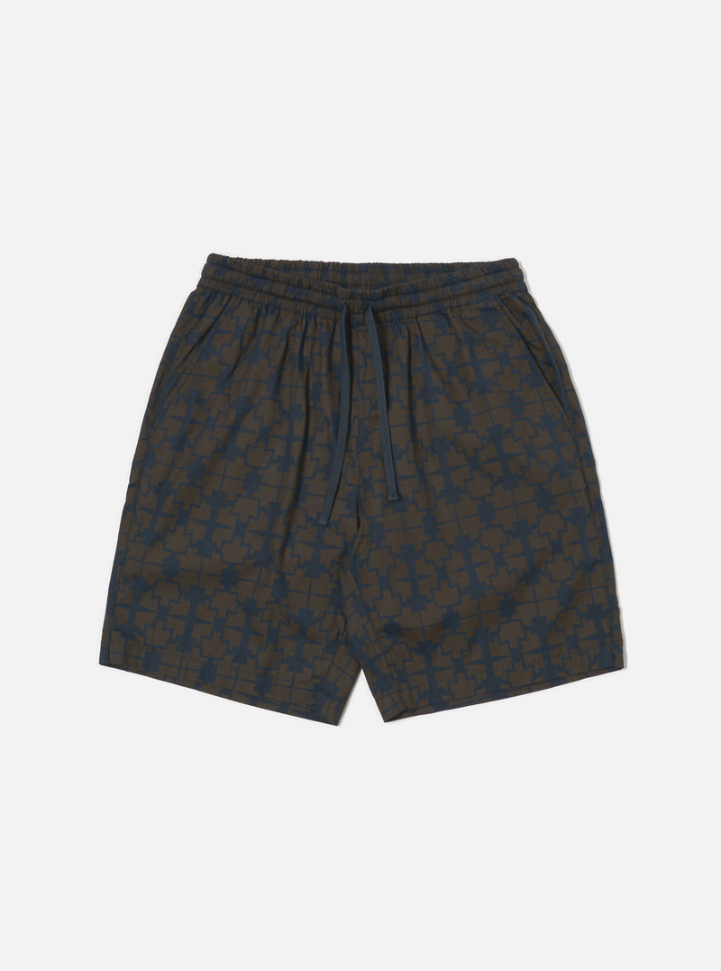 The Navy Mitla Print Cotton Simple Short is displayed on a white background. The shorts are a simple fit and feature a navy and brown geometric print.