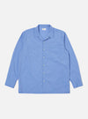 Flat lay of a Blue End On End Cotton Garage Shirt on a white background. The shirt is long-sleeved with two chest pockets.