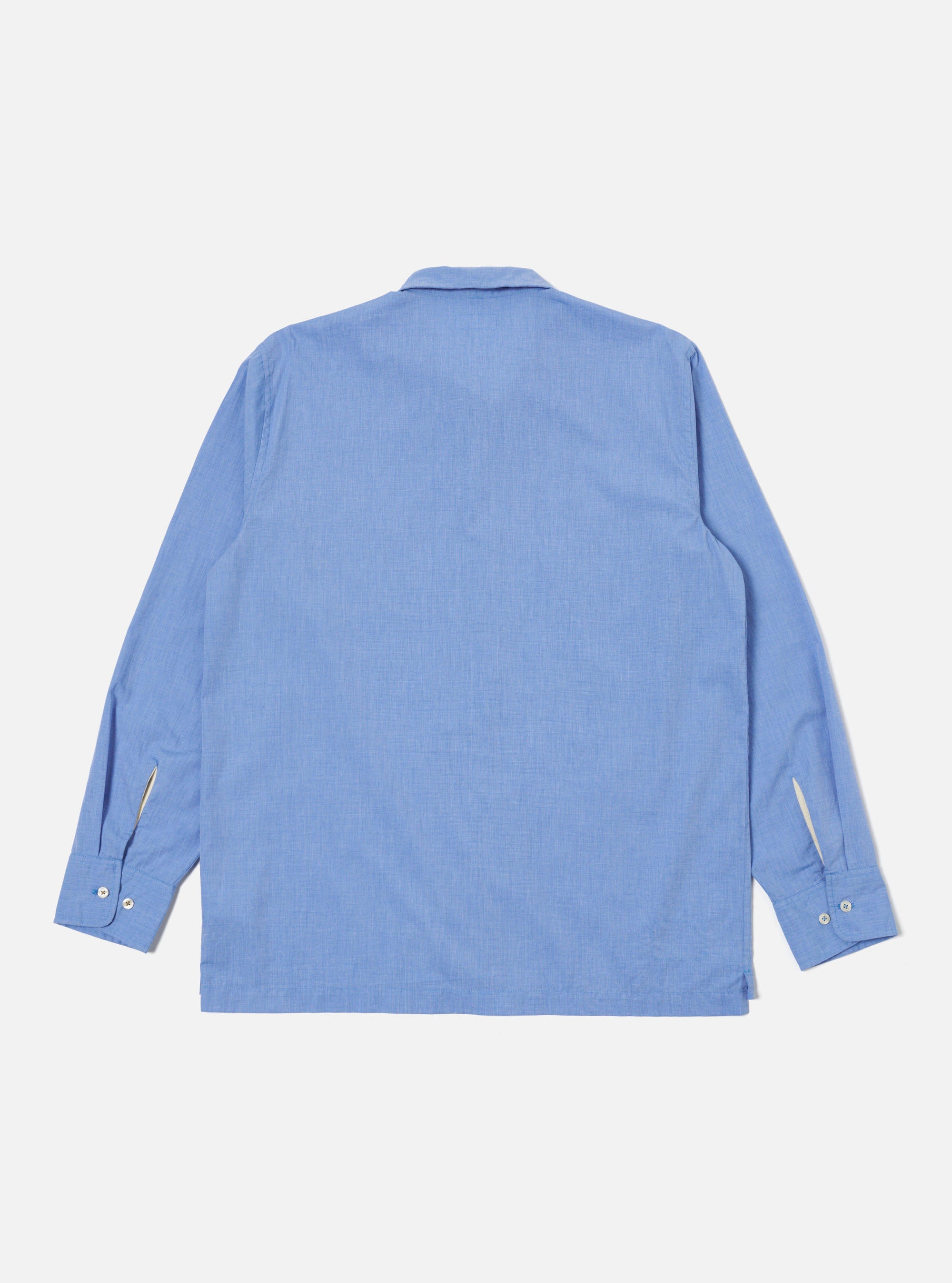 Back view of the Blue End On End Cotton Garage Shirt on a white background. The shirt is long-sleeved and made of a light blue cotton fabric.