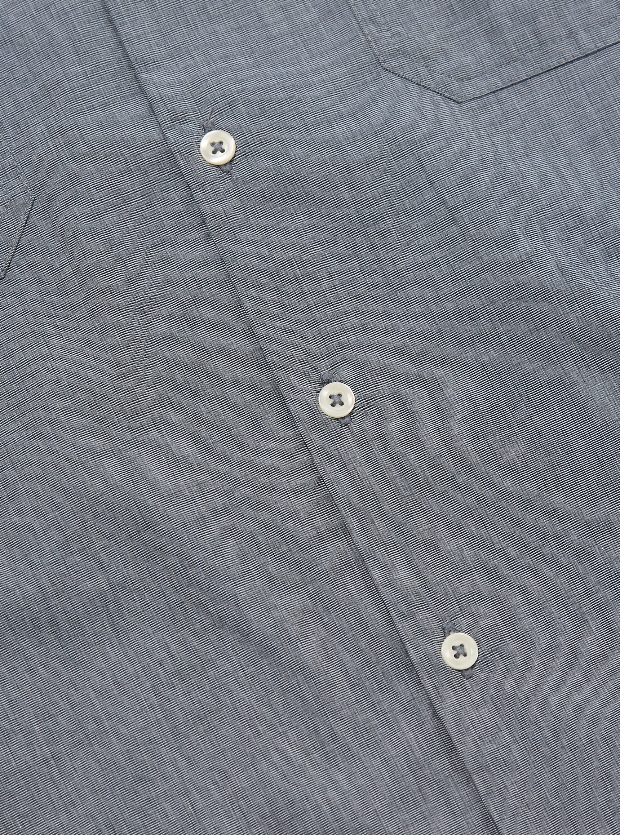 Close-up of the grey End On End Cotton Garage Shirt. The shirt is a light grey with white buttons. The background is a plain white.