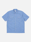 The Blue End On End Cotton Utility SS Shirt, a light blue cotton short sleeve shirt with white contrast stitching, laid flat on a white background.