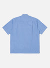 Back view of the Blue End On End Cotton Utility SS Shirt on a white background. The shirt is light blue with short sleeves and white stitching.