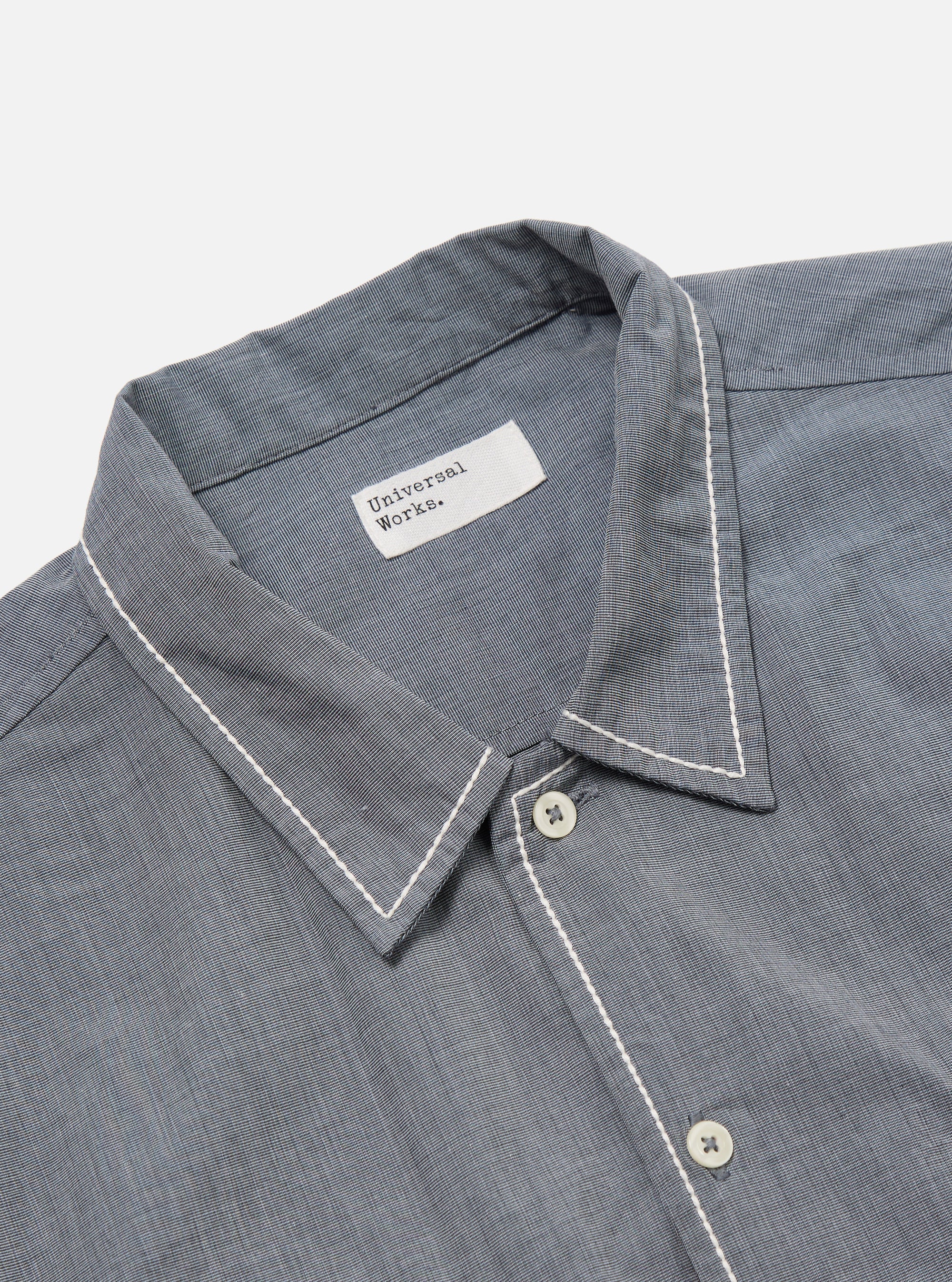 Close-up of the Grey End On End Cotton Utility SS Shirt on a white background. The shirt is cotton with white contrast stitching on the collar and placket.