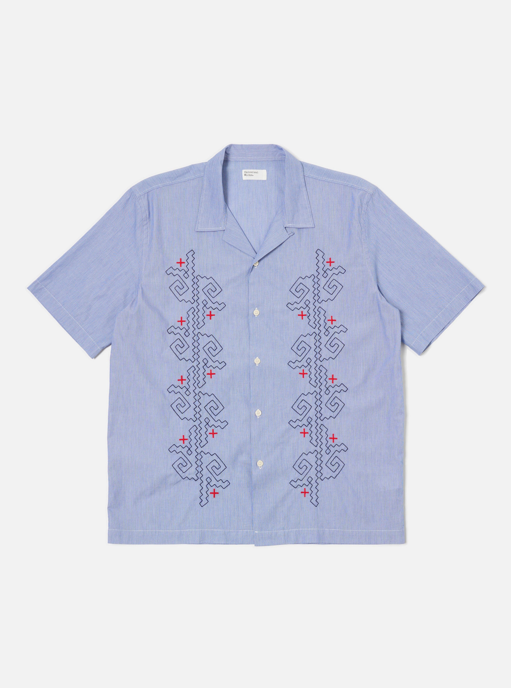 The Blue Classic Stripes Road Trip Shirt, light blue with red and navy embroidery, short sleeves, on a white background.