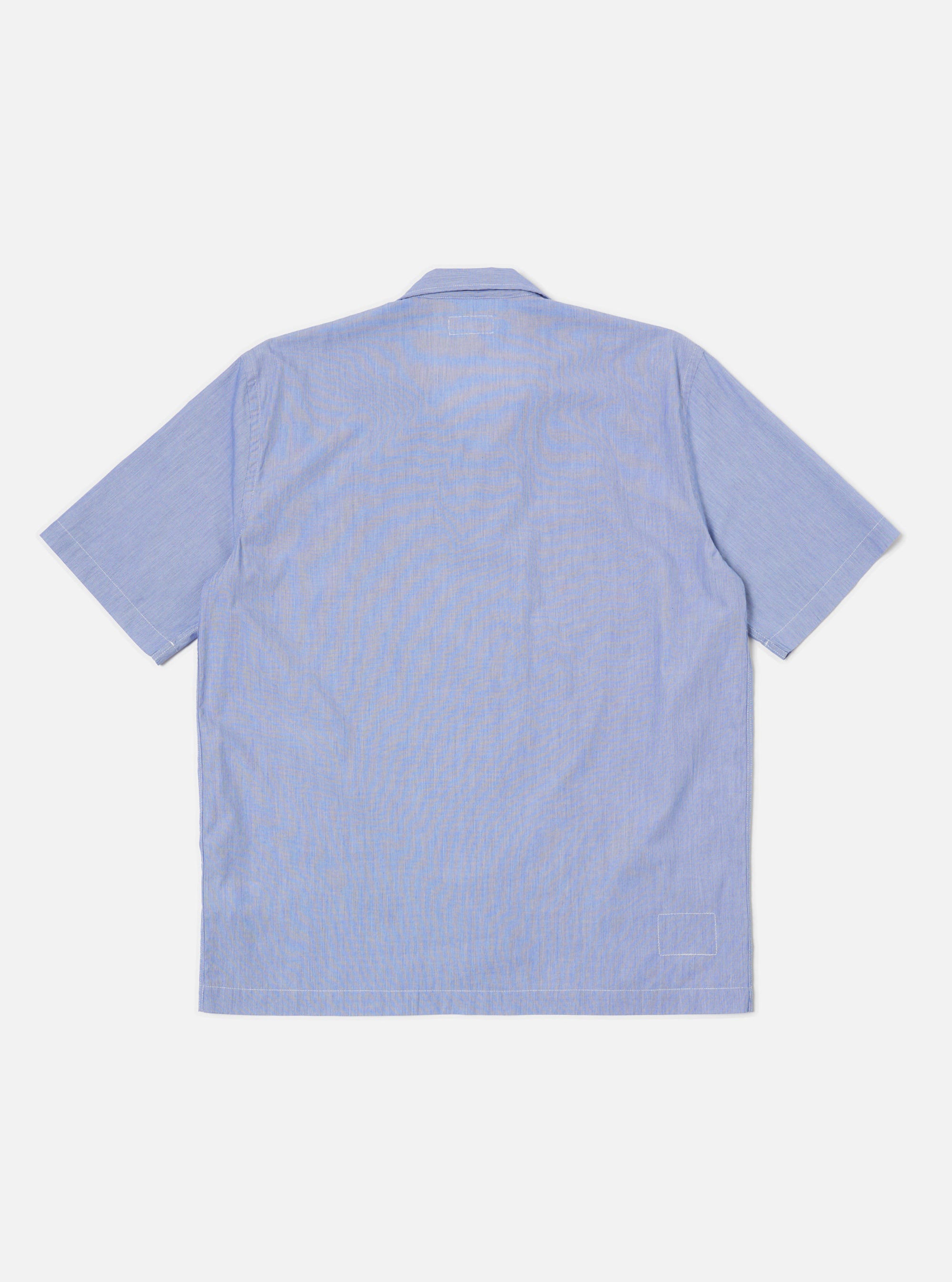 The Blue Classic Stripes Road Trip Shirt is displayed on a white background. The shirt features a blue and white striped pattern and short sleeves.
