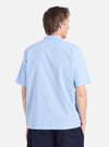 Back view of a man wearing a Blue Vila Stripes Sal Road Shirt. The shirt has a light blue and white striped pattern. The background is a plain white.