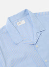 Close-up of the Blue Vila Stripes Sal Road Shirt on a white background. The shirt features light blue, white, and navy stripes. The collar and pocket are visible.