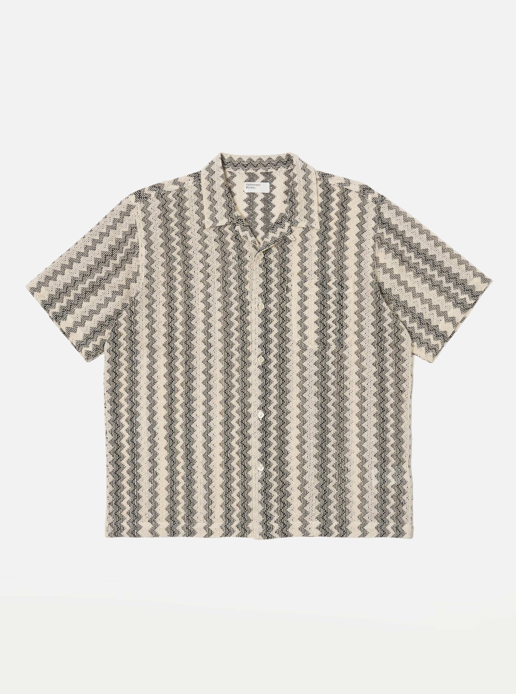 The Charcoal Cotton Lattice Road Shirt is laid flat on a white background. The shirt has a charcoal and beige lattice pattern.