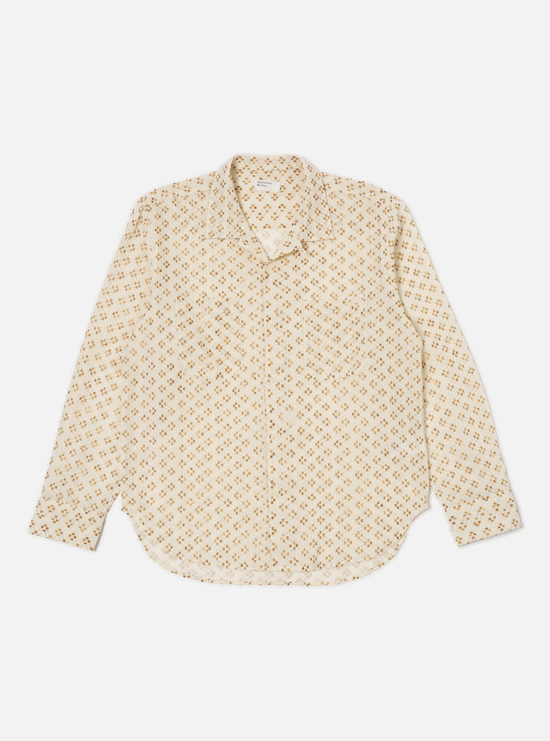 The Camel Mitla Weave Work Shirt, a cream-colored long-sleeve shirt with a brown geometric pattern, is laid flat on a white background.