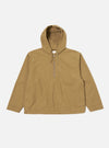 The Dark Sand Peach Recycled Nylon Liam Jacket, a hooded jacket in a light brown color, is laid flat on a white background. The jacket has a half-zip closure.