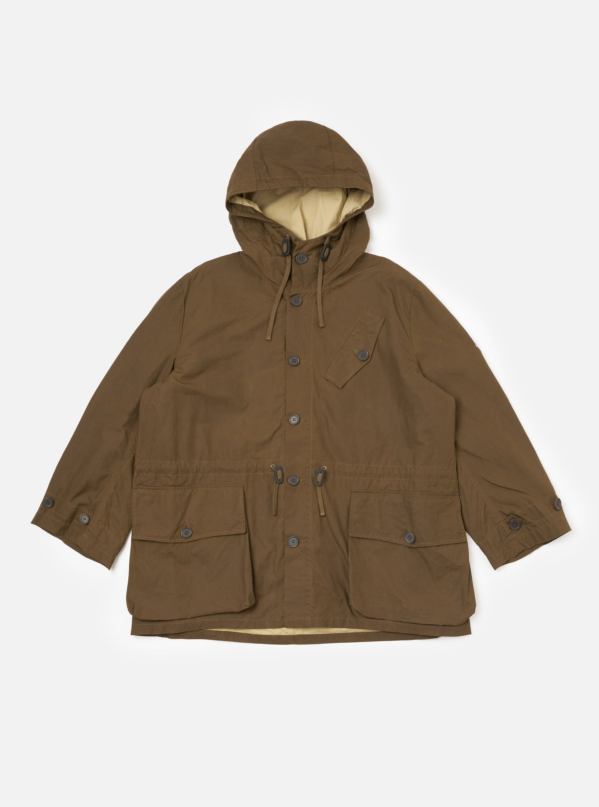 The Brown British Wax Cotton Boston Parka, displayed on a white background. The parka features a hood, button closure, and multiple pockets.